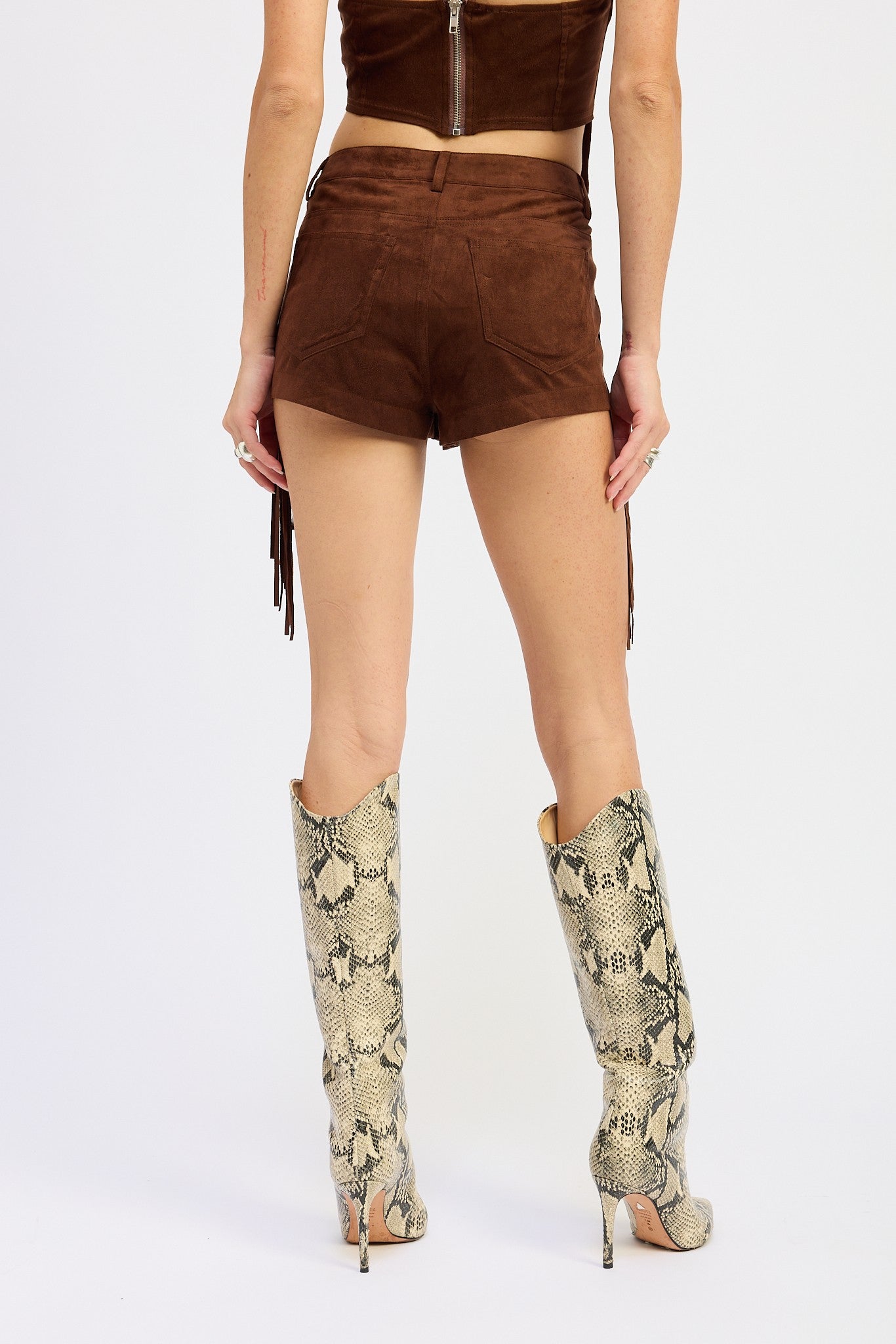 Serving In Suede Shorts