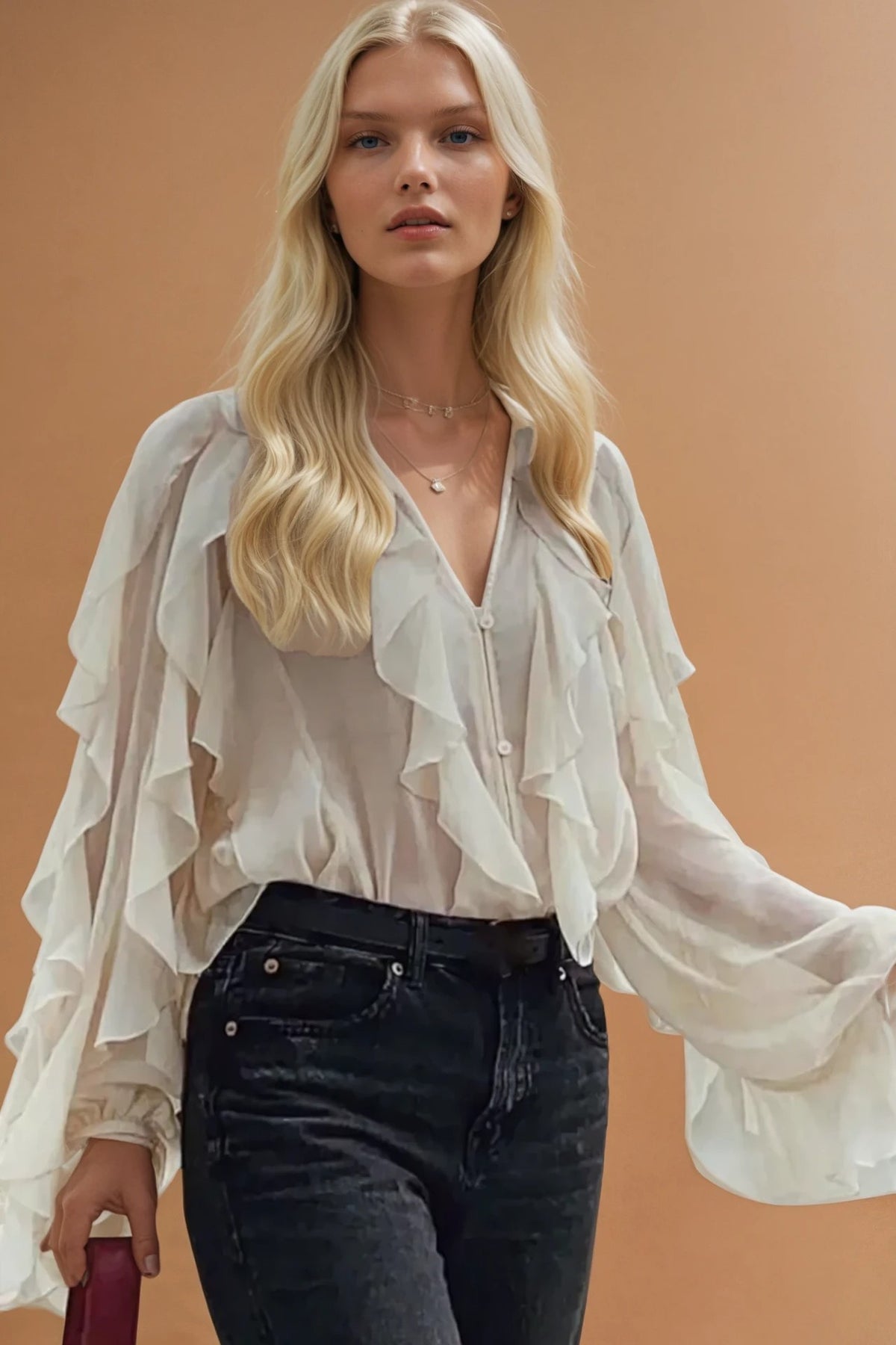 Cream sheer blouse with full balloon sleeves and elasticated cuffs