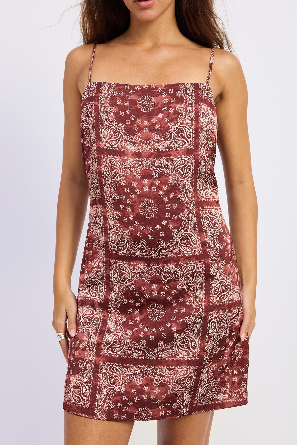Burgundy bandana print satin mini dress with a square neckline and thin straps